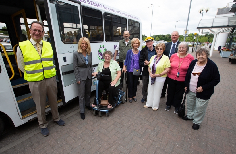 Esther with Beryl Chapman, bus users, trustees and volunteer drivers