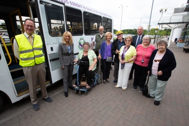 Esther with Beryl Chapman, bus users, trustees and volunteer drivers